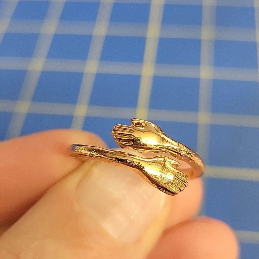 Hands Hugging Gold Tone Ring Adjustable